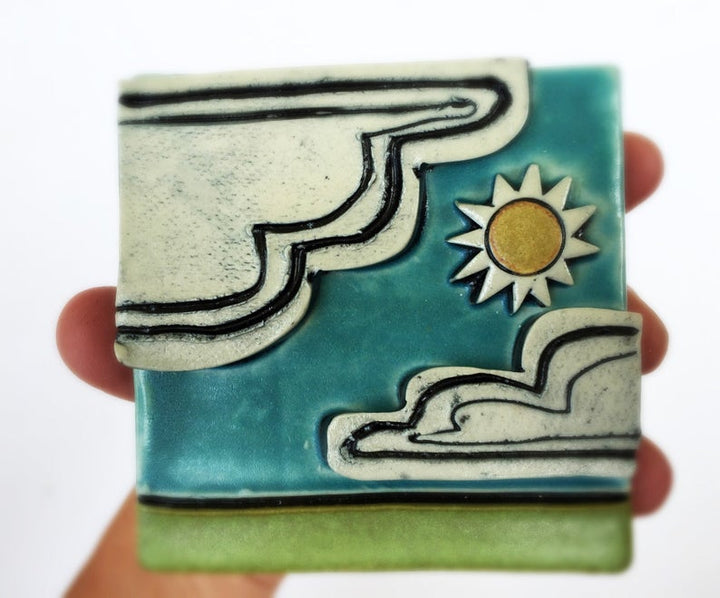 Clique Tile Clouds & Sun